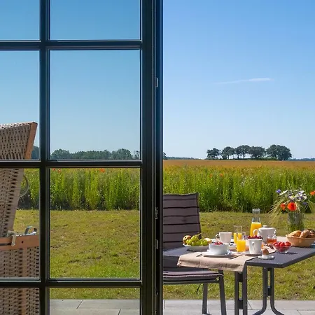 Casa de Férias Reetdachhaeuser Am Bakenberg