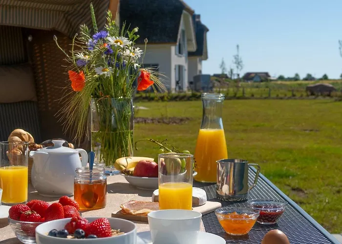 Ferienhaus Reetdachhäuser Am Bakenberg *